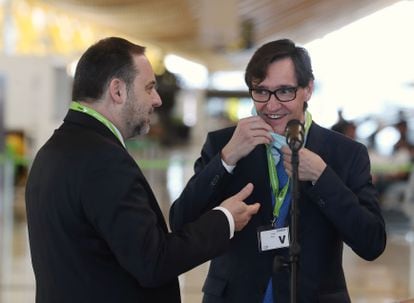 Spain's Public Works Minister José Luis Abalos (l) and Health Minister Salvador Illa during their visit to Madrid’s Barajas Airport on Saturday, a day ahead of the reopening of borders.