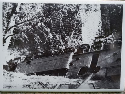 The derailed train carrying German armaments near Meymac, 1944.