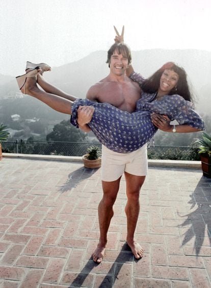 Donna Summer in the arms of Arnold Schwarzenegger at a party at his Los Angeles home in April 1977.