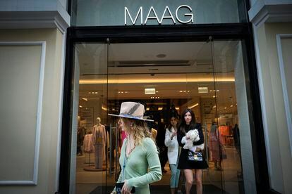 A woman exits a newly opened Maag store, a former Zara flagship store, in Moscow, Russia, on April 27, 2023.