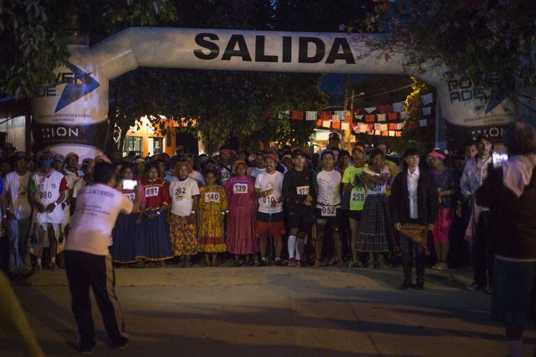 At 6am on the day of the ultramarathon, competitors line up in the main square of Urique to begin the 80-kilometer race.