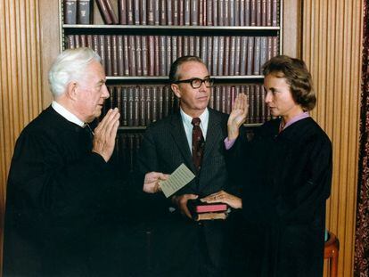 Sandra Day O'Connor is sworn in as a justice of the United States Supreme Court in the presence of her husband, John O'Connor, before Chief Justice Warren Burger in September 1981.