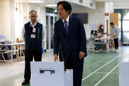 Lai Ching-te, Taiwan's vice president, votes in the elections won Saturday by his party, the Democratic Progressive Party.