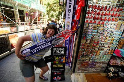 A woman with a scarf from the 2018 UEFA Champions League final in Madrid.