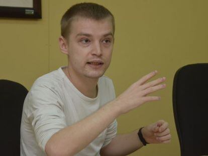 Maxim Chukharev, a suspect in the Liberty Reserve case, speaks to a reporter.