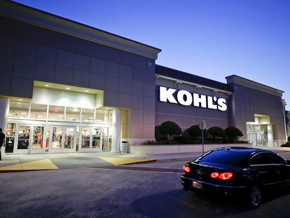 A car drives by the entrance of a Kohl's department store in Orlando, Florida, in August 2017.