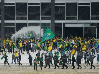Protesters, supporters of Brazil's former President Jair Bolsonaro, storm the Supreme Court building in Brasilia, Brazil, Jan. 8, 2023