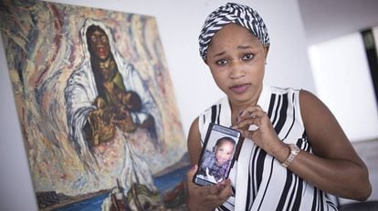 Mariam Berete with a photo of her biological son.