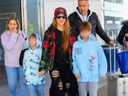 Shakira, with her two children, Sasha and Milan, at JFK airport in New York on March 9, 2023.