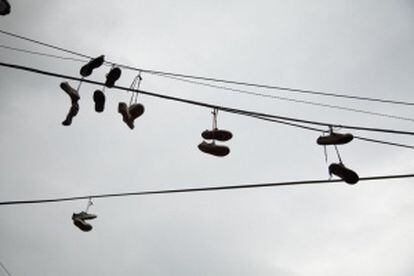 Sneakers hanging from wires in Medellín.