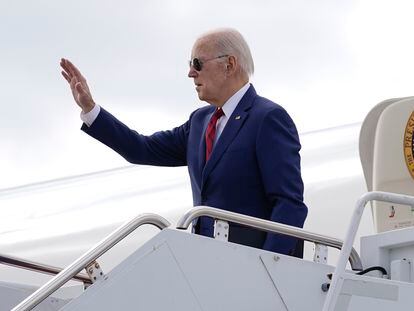 President Joe Biden waves before boarding Air Force One at Delaware Air National Guard Base in New Castle, Delaware, on March 5, 2023.