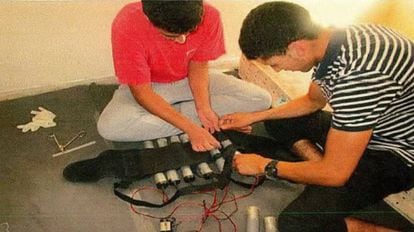 Youssef Aalla and Younes Abouyaaqoub fitting a vest with explosives.