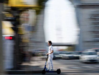 A man rides an electric scooter in Paris, on January 15, 2023.