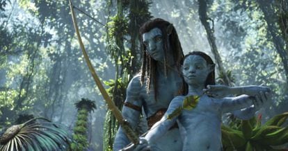 Jake, with one of his children, Neteyam, in the sequel.