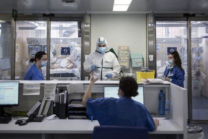 Inside the ICU, it’s hard to recognize the heroes who are applauded each night at 8pm by citizens across Spain