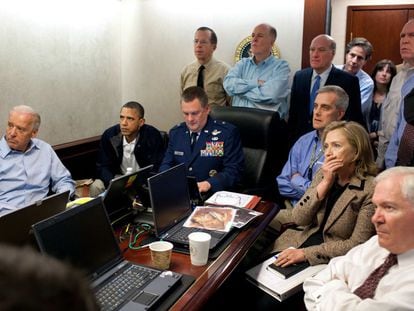 In this May 1, 2011 file image released by the White House and digitally altered by the source to diffuse the paper in front of Secretary of State Hillary Clinton, President Barack Obama and Vice President Joe Biden, along with members of the national security team, receive an update on the mission against Osama bin Laden in the Situation Room of the White House in Washington.