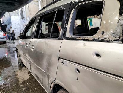 A car damaged by bullets at the Nur Shams refugee camp, near the West Bank city of Tulkarem, on Tuesday.