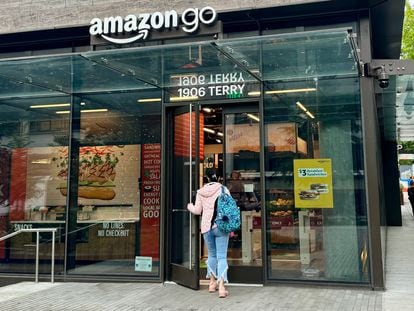 A customer entering an Amazon Go store in Seattle.