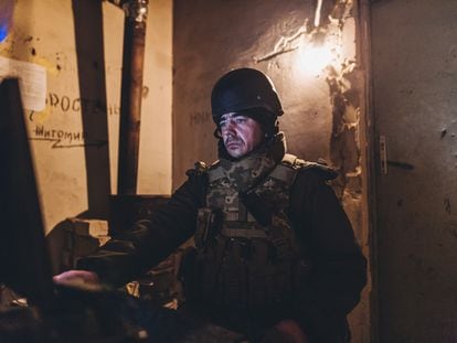 A Ukrainian soldier on a computer on the outskirts of Donetsk, on February 10.