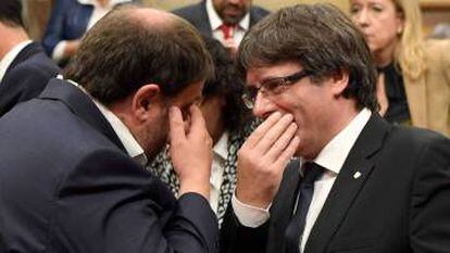 Oriol Junqueras (left) and Carles Puigdemont.
