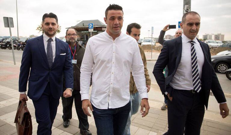 Property owner David Serrano (c) arriving in court.