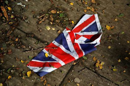 A soiled Union Jack on a London street the day after the Brexit vote.