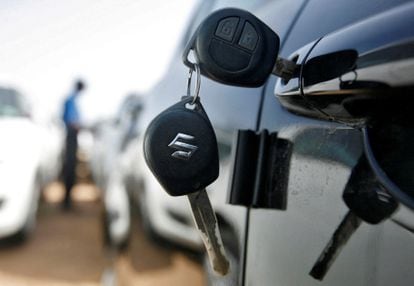 Keys hang from the door of a Maruti Suzuki Swift car at its stockyard on the outskirts of the western Indian city of Ahmedabad April 26, 2013
