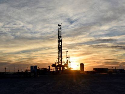 Drilling rigs operate at sunset in Midland, Texas, U.S., February 13, 2019. Picture taken February 13, 2019.