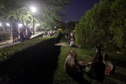 People at Madrid's Vistillas park on Friday night.