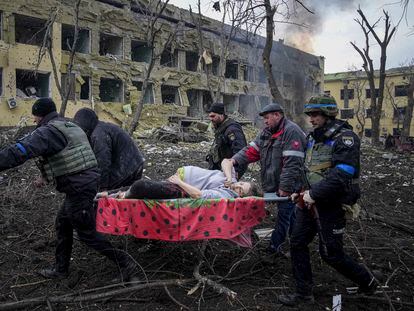 A pregnant woman is rescued after Russia bombs a maternity hospital in Mariupol on Wednesday.