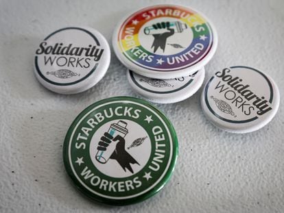 Buttons showing support for a Starbucks Union are seen at the Workers United offices in Buffalo, New York, February 23, 2022.