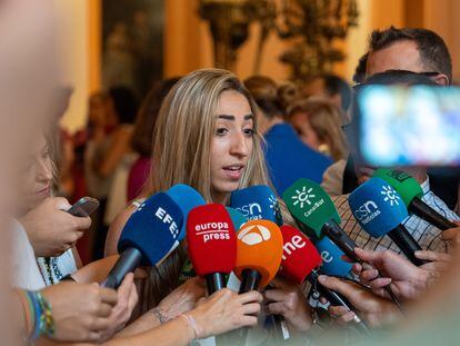 Olga Carmona addresses the media in Seville.