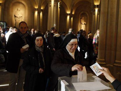 A nun casts her vote in Barcelona.