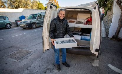 José Manuel Aguilar sells fresh fish from his van in the village of Lecrín.