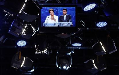 Rousseff and Neves in their first TV debate ahead of the runoff.
