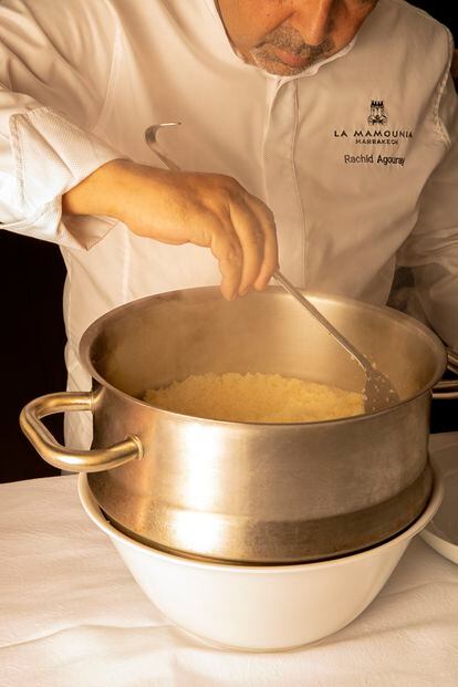 Chef Rachid Agoulay (Hotel La Mamounia, Marrakech) prepares couscous, the restaurant's trademark dish.