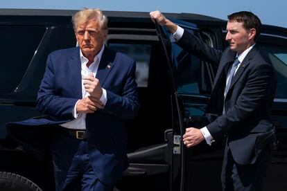 Former President Trump at West Palm Beach International Airport on March 25 before boarding a plane for a rally in Waco, Texas.