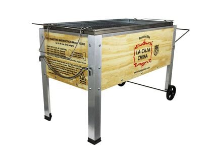 The peculiar roasting box that has become a fixture at Florida patios and BBQ parties was invented in 1986 by a Cuban immigrant—photo courtesy La Caja China/lacajachina.com.