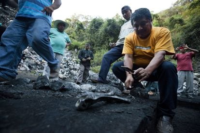 Miguel Ángel Jiménez, searching for remains at a trash dump in Cocula.