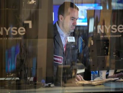Traders work on the floor at the New York Stock Exchange in New York, Wednesday, Feb. 1, 2023.