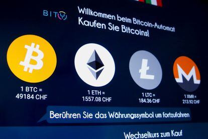 Logos of some cryptocurrencies in an ATM in Zurich (Switzerland), last year.