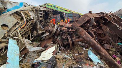 Rescue workers search for survivors at the accident site of a three-train collision near Balasore, about 200 km (125 miles) from the state capital Bhubaneswar, on June 3, 2023.