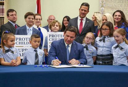 Florida Governor Ron DeSantis signs the Parental Rights in Education bill at Classical Preparatory school on March 28, 2022, in Shady Hills, Florida.