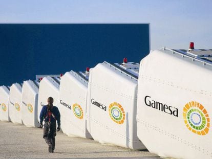 Wind turbine parts made by Gamesa, which has reduced the size of its management structure.