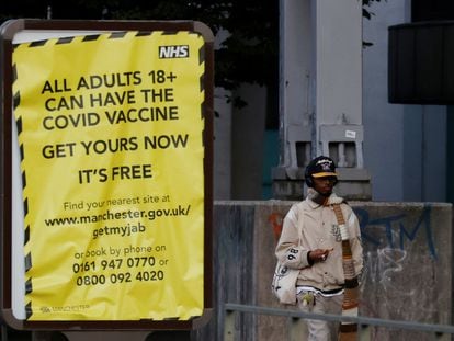 A sign encouraging people to get a Covid-19 vaccine in Manchester.
