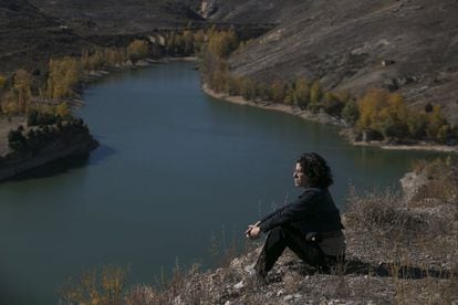 Author Montserrat Iglesias looks out over Linares reservoir.