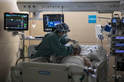 An ICU patient is treated in the Hospital Vall d'Hebron in Barcelona on May 28.