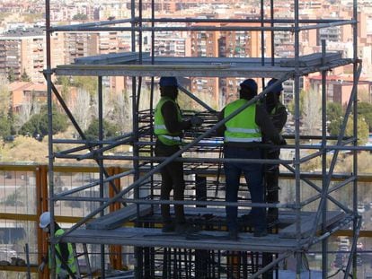 Construction workers at a site in Madrid.