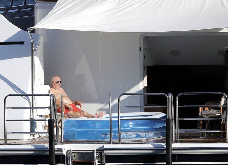 Amancio Ortega lounging on his luxury yacht Valoria.