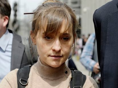Television actor Allison Mack leaves federal court in the Brooklyn borough of New York, April 8, 2019, after pleading guilty to racketeering charges in a case involving a cult-like group based in upstate New York called NXIVM.